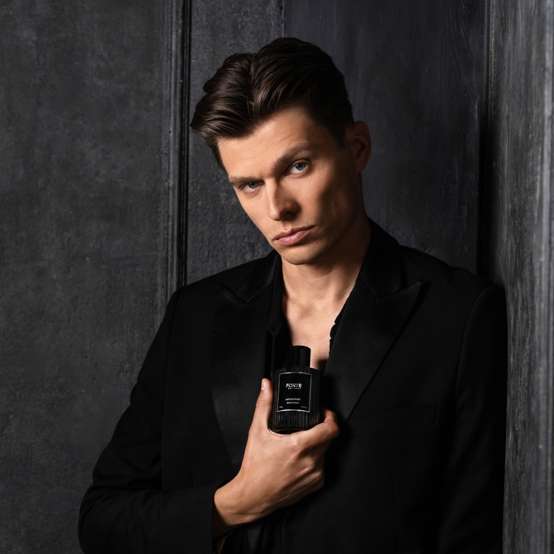 A single green leaf against a white background.