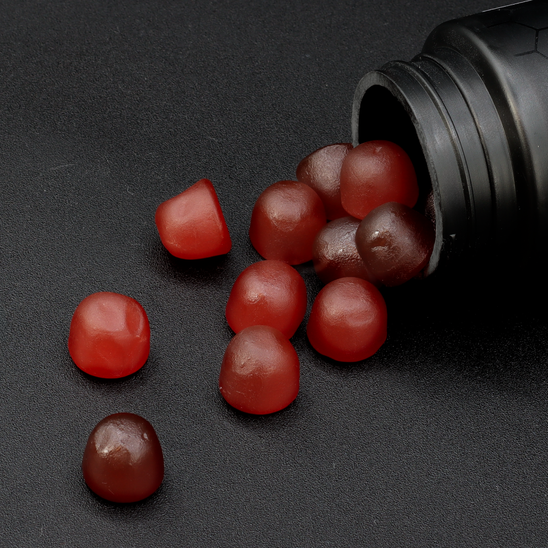 A single green leaf against a white background.