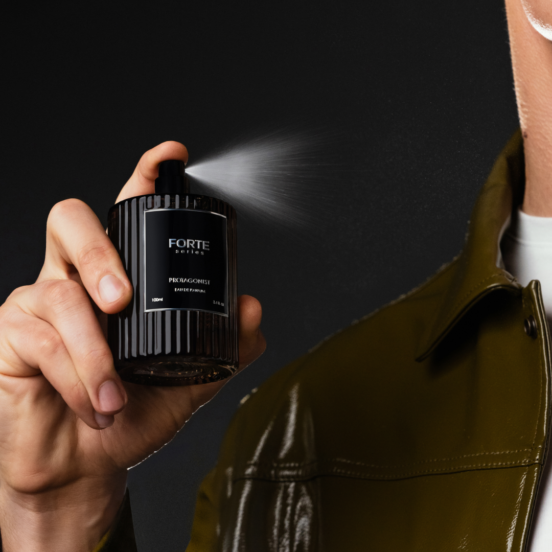 A single green leaf against a white background.