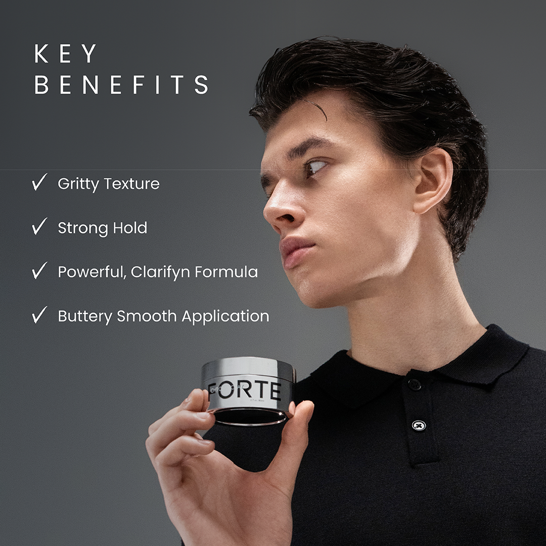 A single green leaf against a white background.