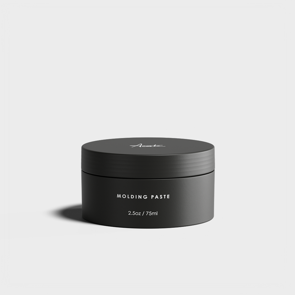 A single green leaf against a white background.