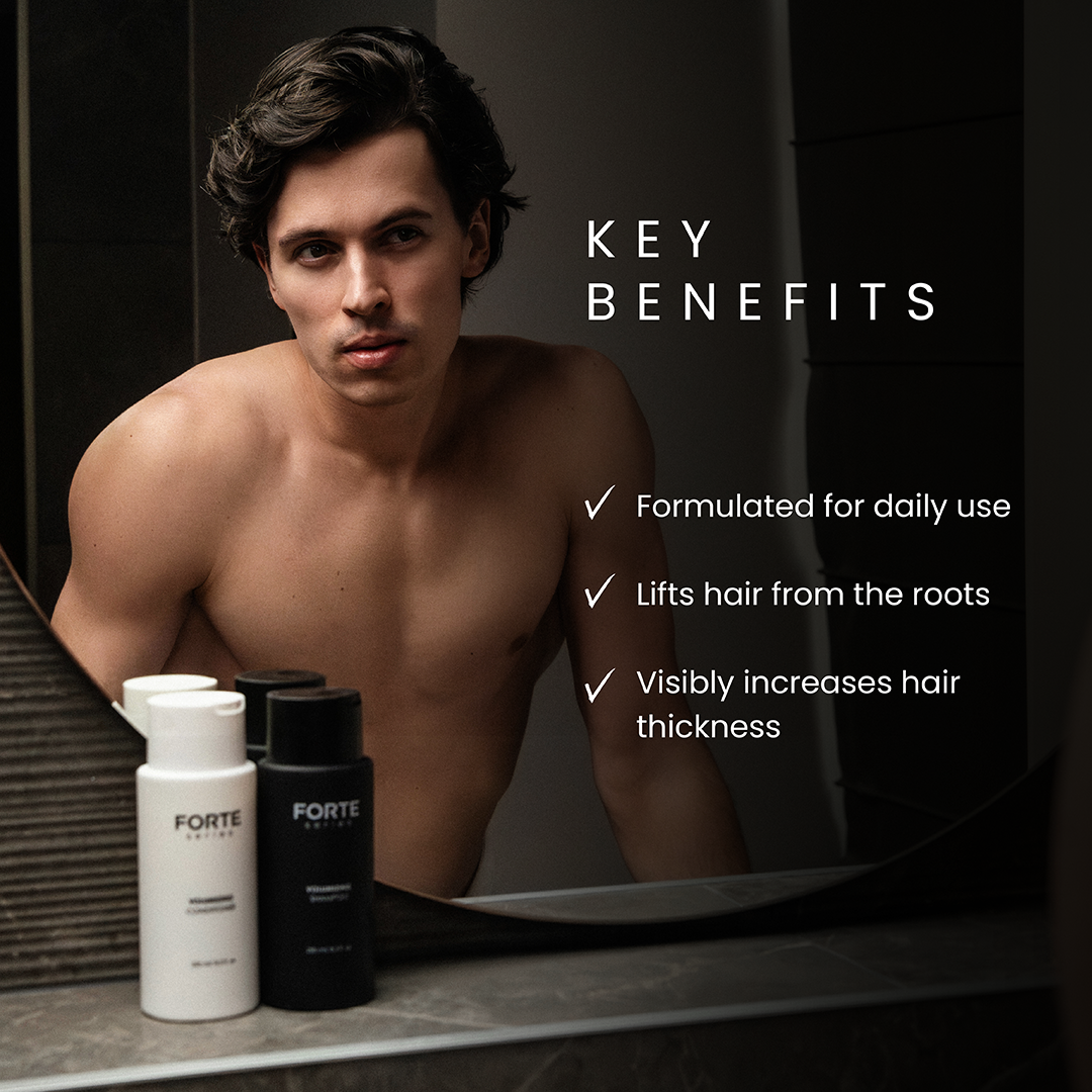 A single green leaf against a white background.