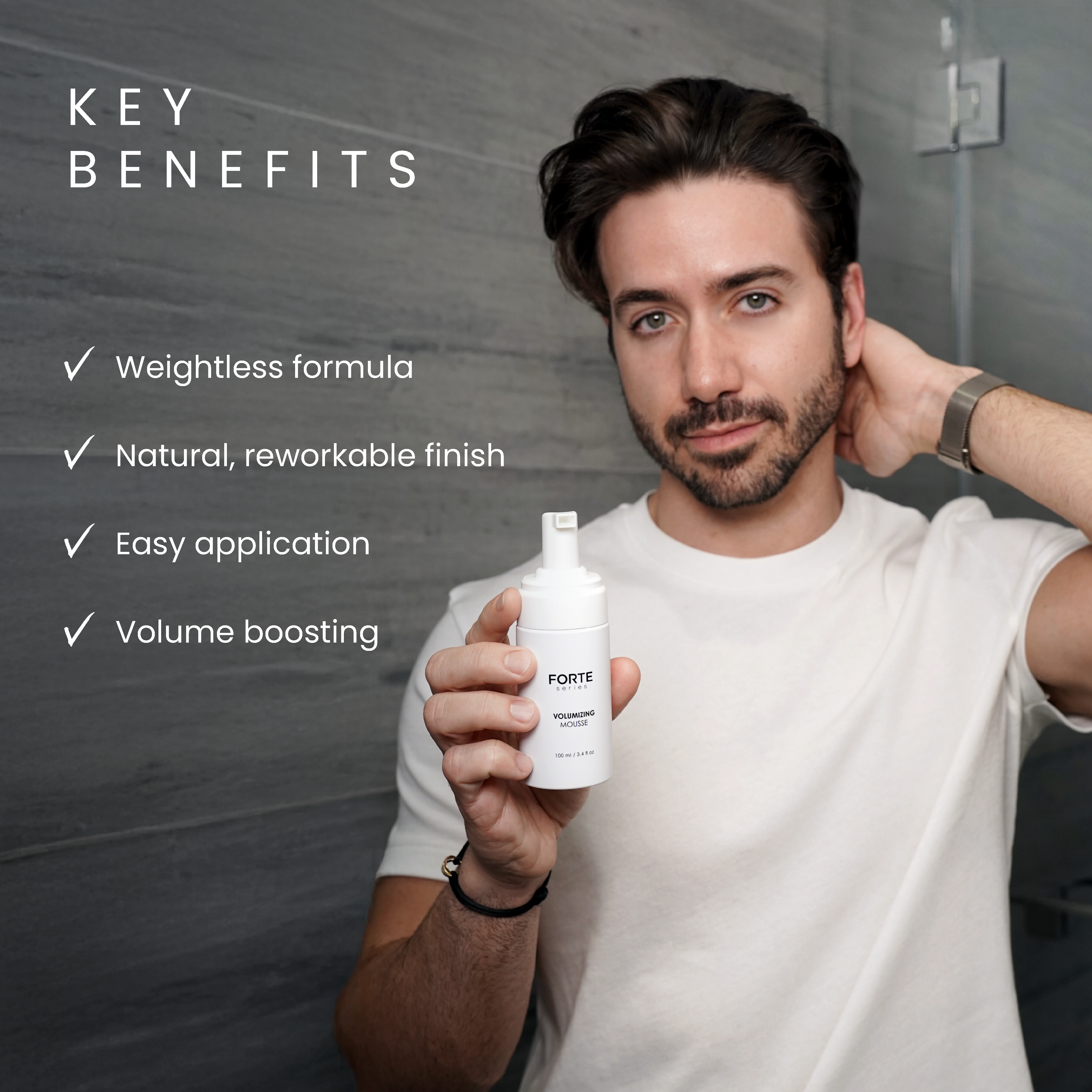 A single green leaf against a white background.